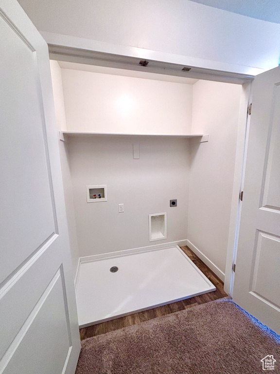 Laundry area with washer hookup, electric dryer hookup, and wood finished floors
