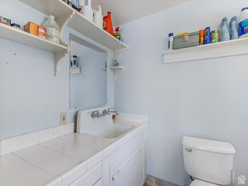Half bath with toilet and vanity
