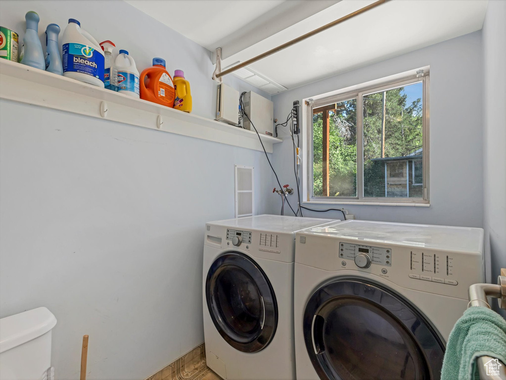 Washroom with separate washer and dryer