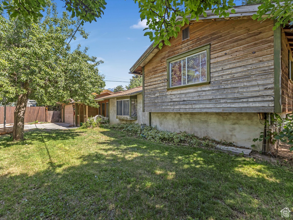 View of property exterior featuring a patio area