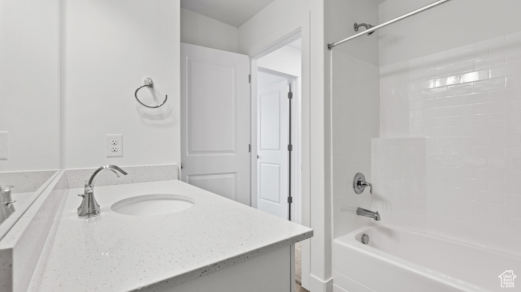 Full bathroom featuring vanity and shower / bathtub combination