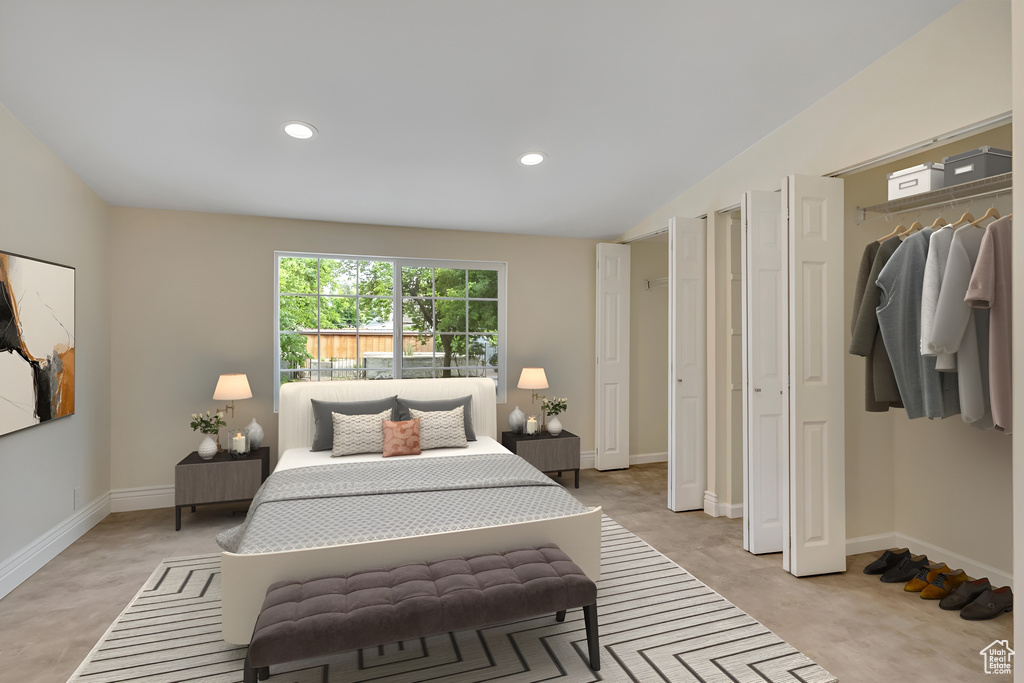 Bedroom featuring recessed lighting and a closet
