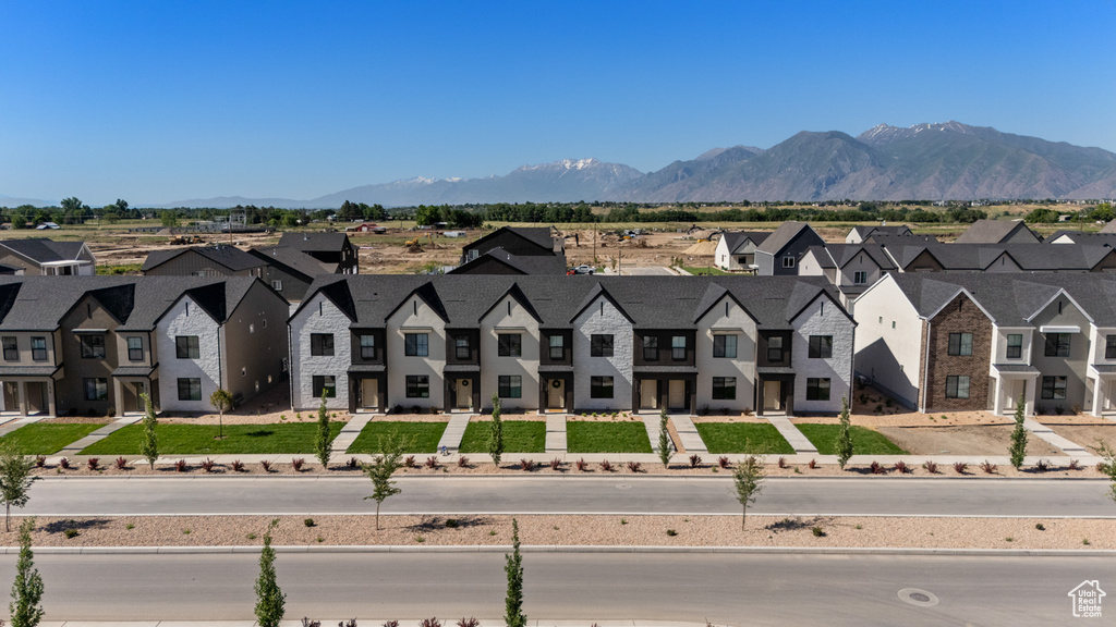 Aerial perspective of suburban area featuring mountains