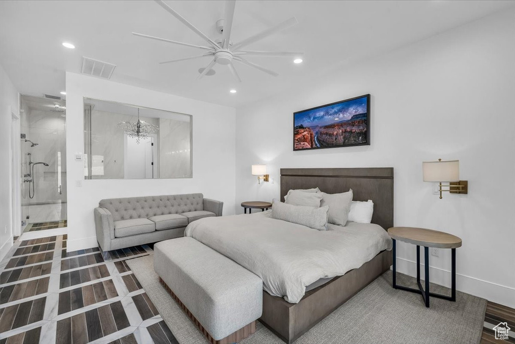 Bedroom featuring recessed lighting, wood finished floors, a ceiling fan, and a chandelier