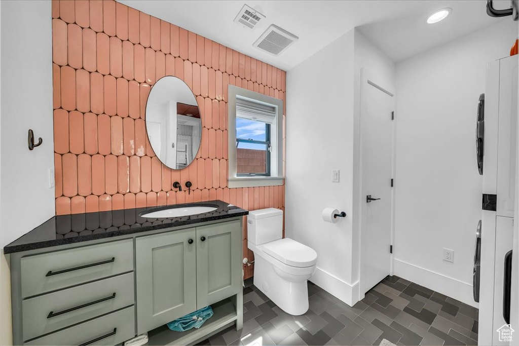 Bathroom with vanity and tile patterned floors