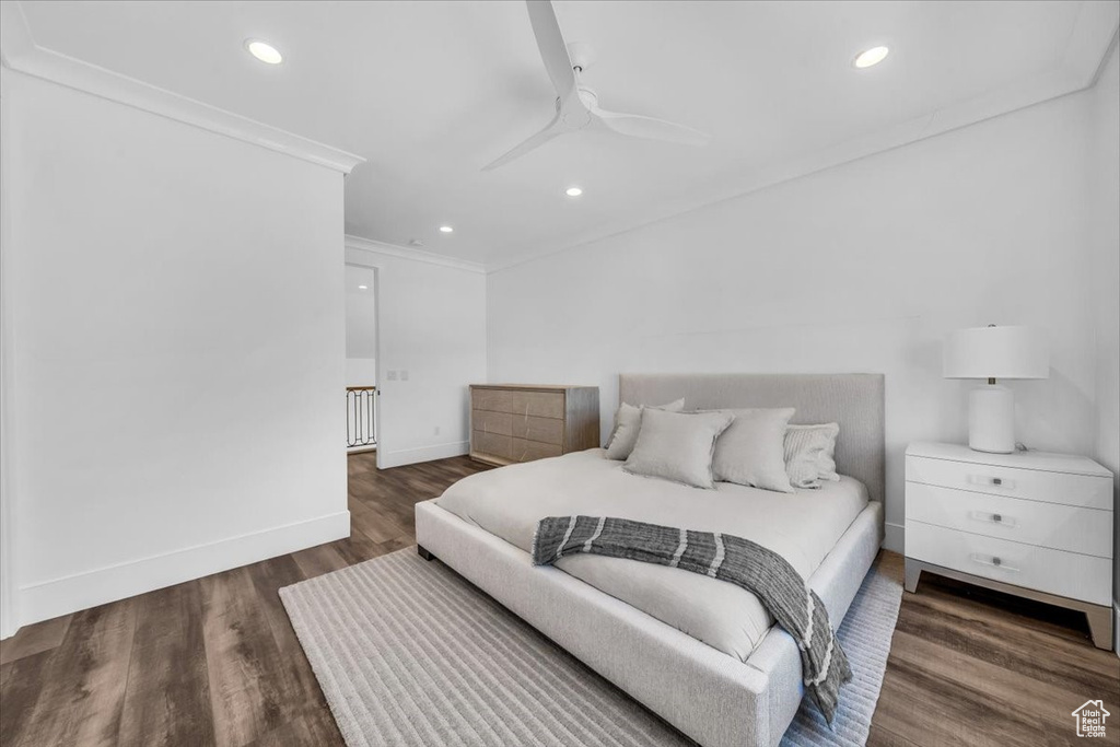 Bedroom with ornamental molding, recessed lighting, wood finished floors, and a ceiling fan