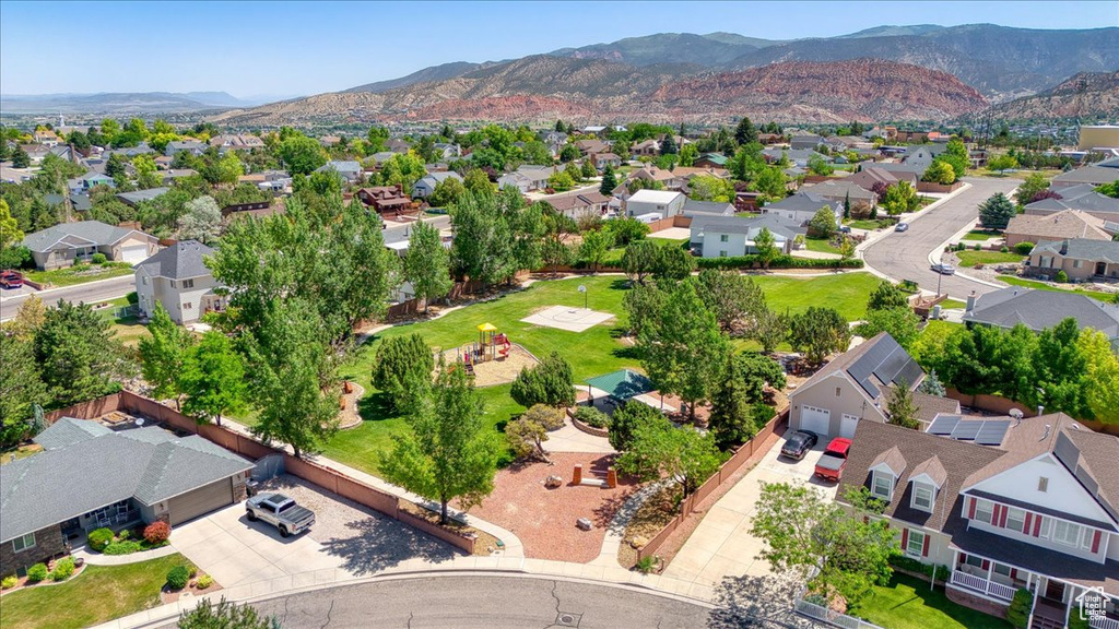 Aerial view of residential area featuring mountains