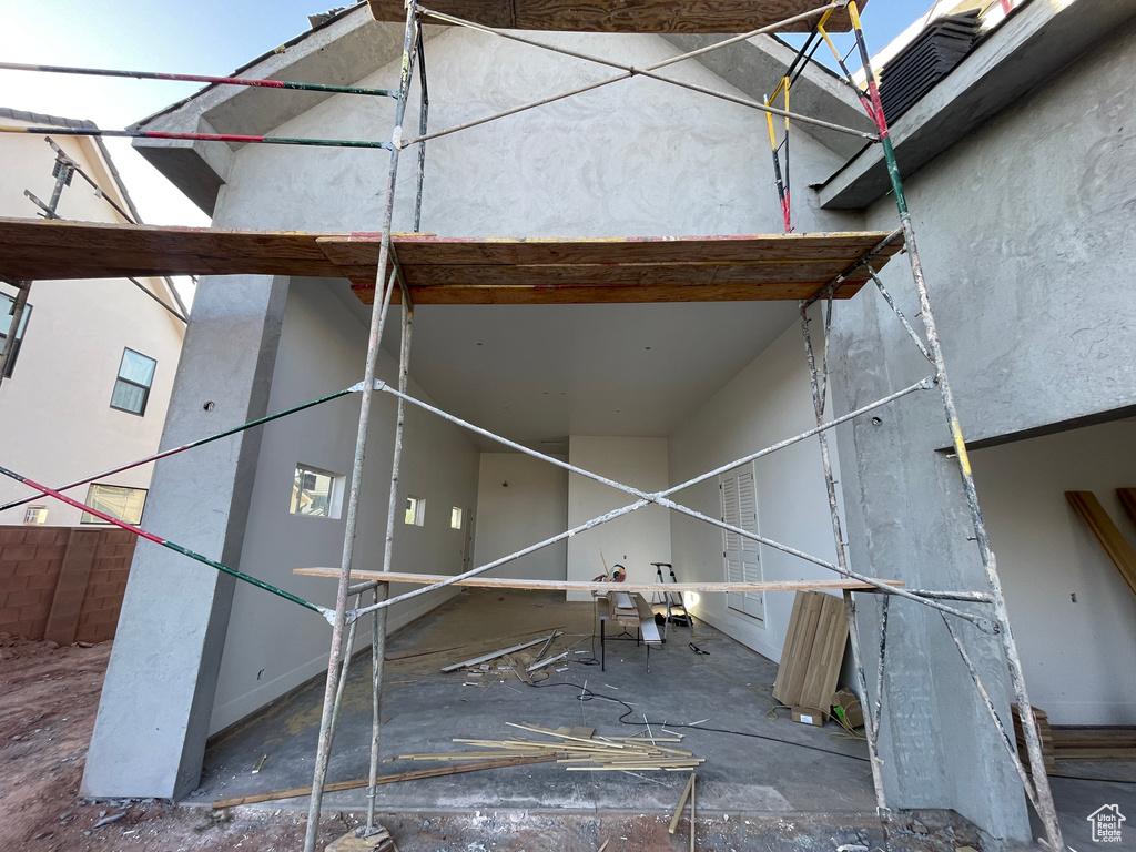 Exterior space featuring stucco siding