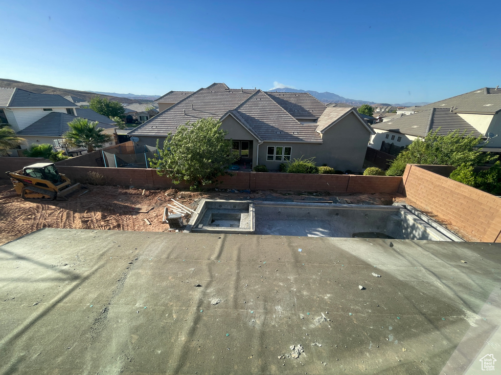 View of front of property with a residential view