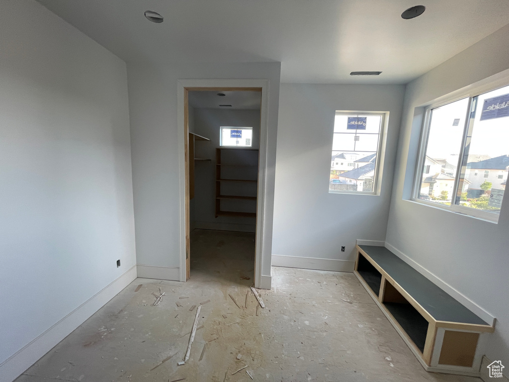 Unfurnished bedroom with baseboards