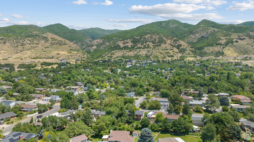 Aerial overview of property's location with a mountain backdrop