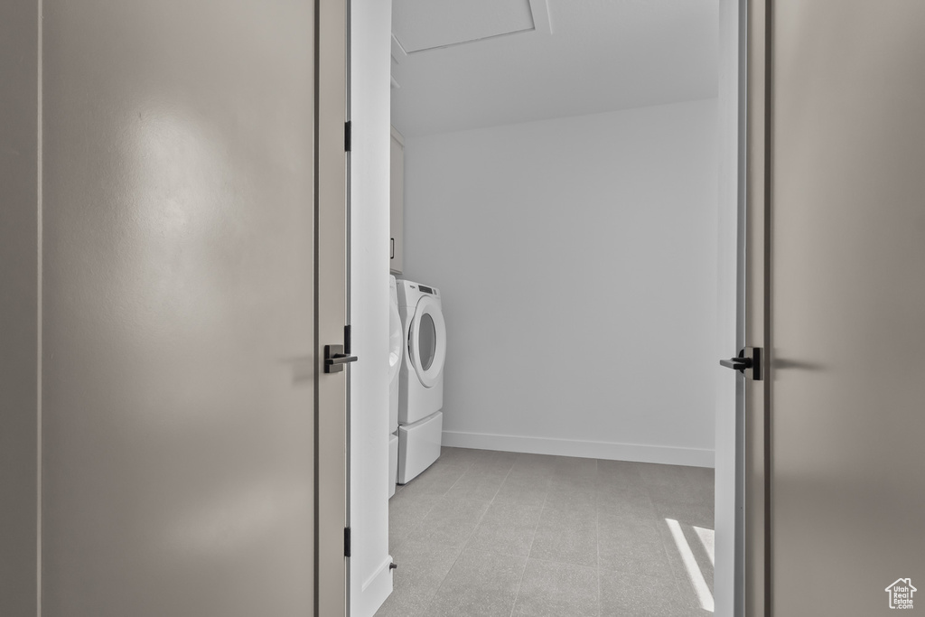 Laundry area featuring baseboards