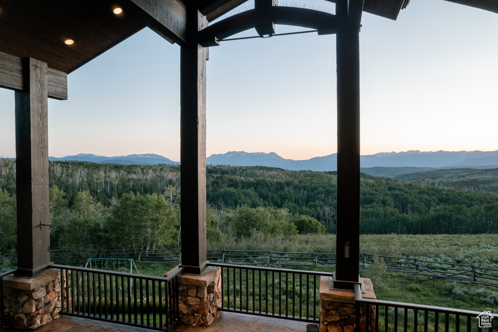 View of mountain backdrop with a forest