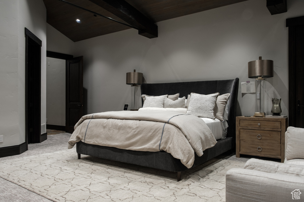 Bedroom featuring carpet floors and wooden ceiling