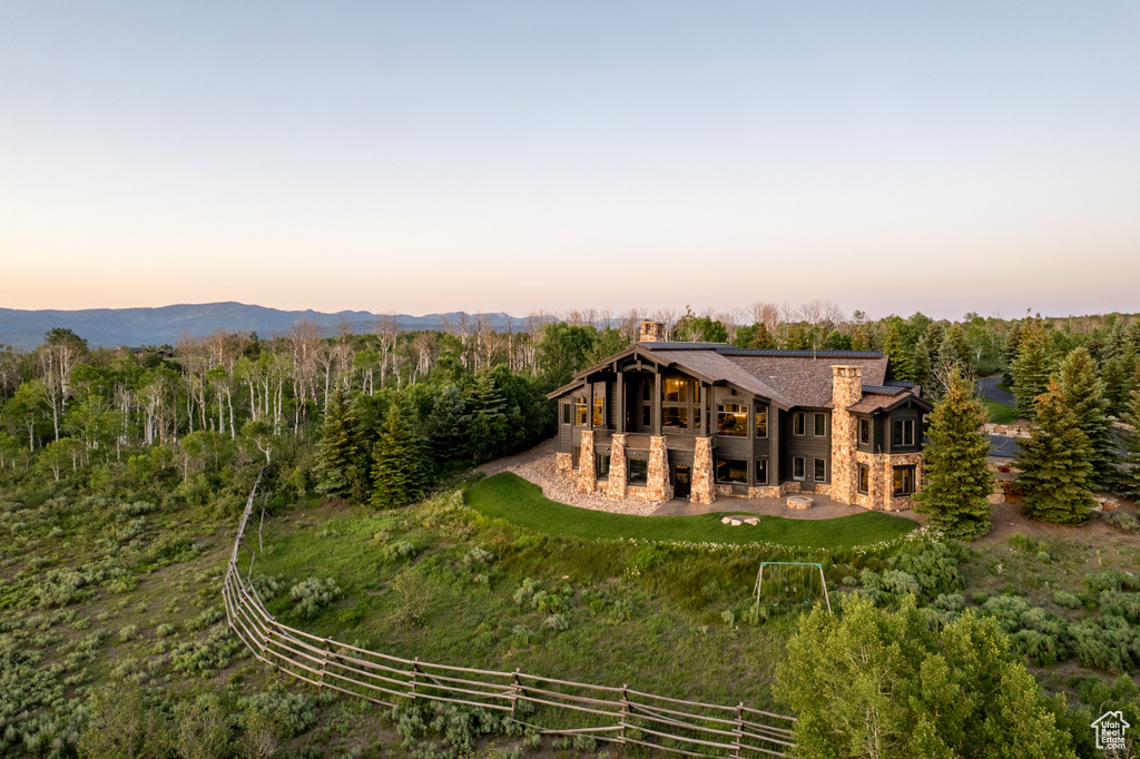 Aerial view at dusk of a wooded view