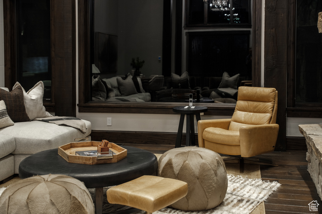Living room featuring dark wood-style floors
