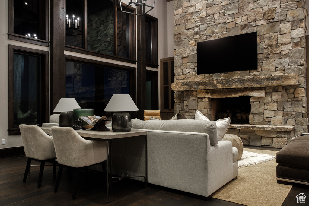 Living area featuring a fireplace and wood finished floors