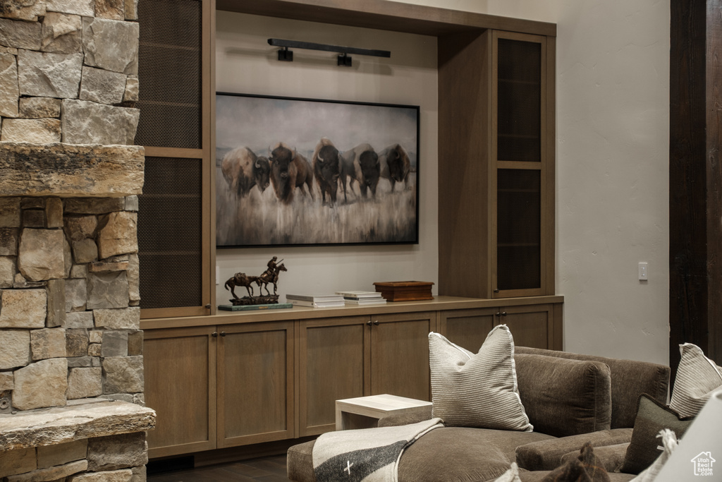 Living room featuring dark wood-style flooring