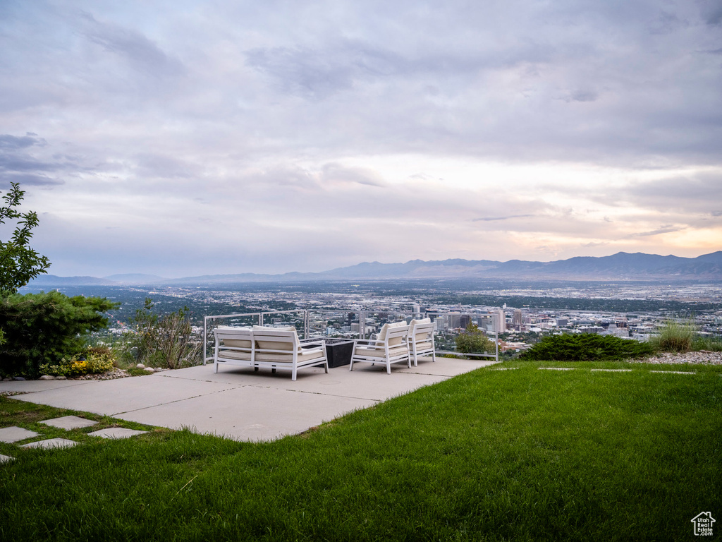 View of green lawn with a mountain view