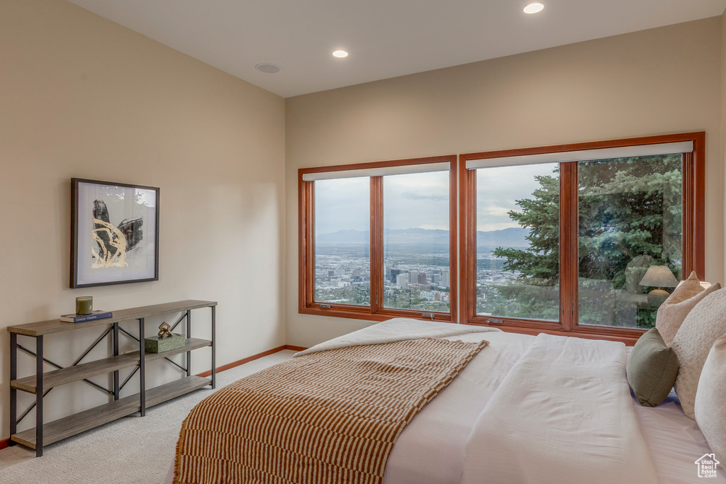 Bedroom featuring light carpet and recessed lighting