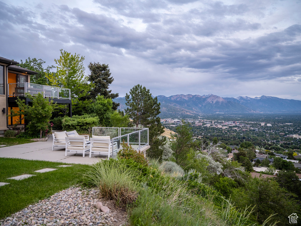 View of yard featuring a patio area and a mountain view