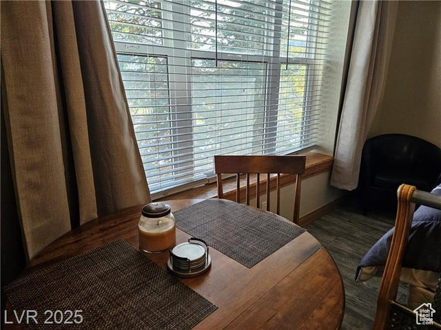 Dining space with wood finished floors