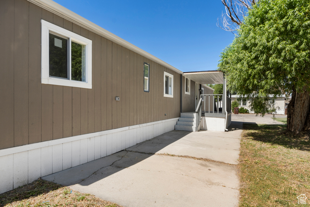 View of home's exterior with a patio