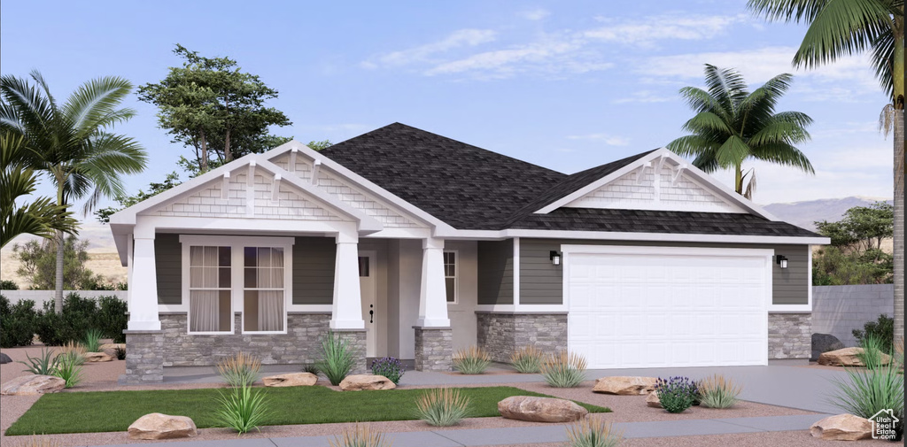 Craftsman-style home featuring stone siding, an attached garage, driveway, and roof with shingles