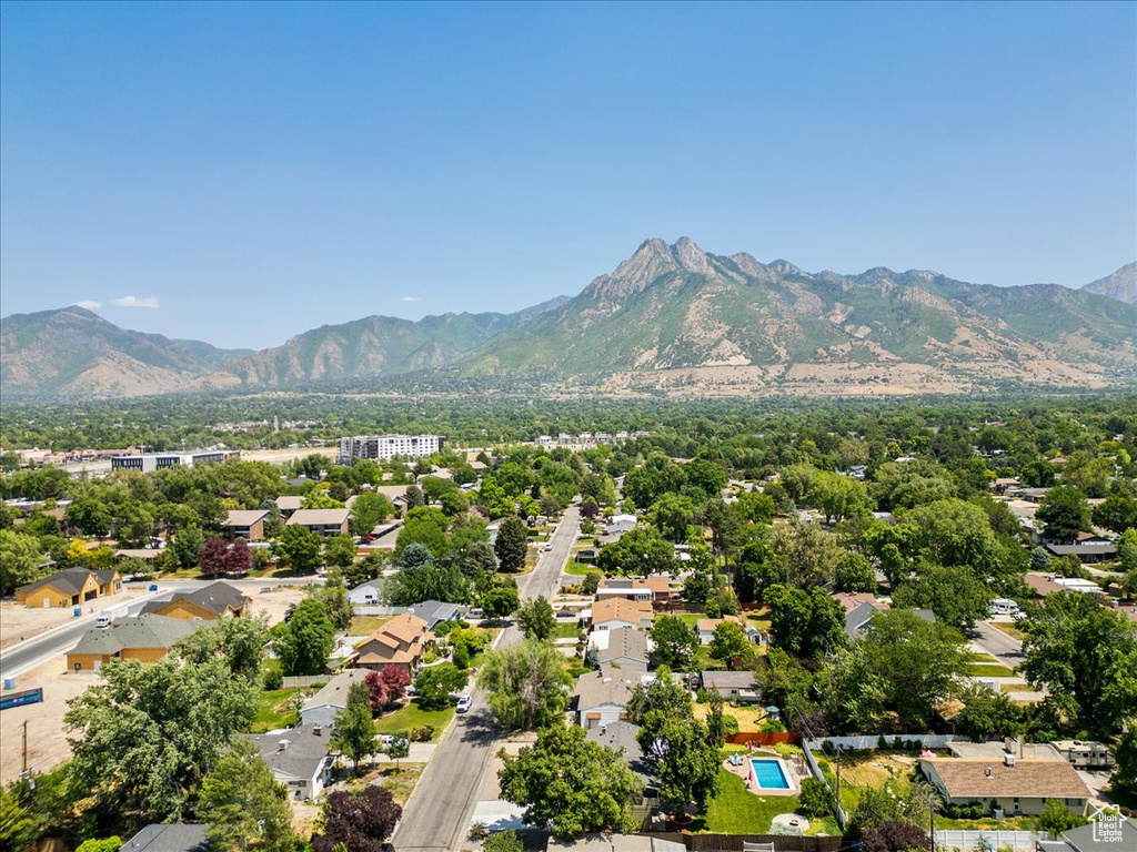 Aerial view of residential area featuring mountains