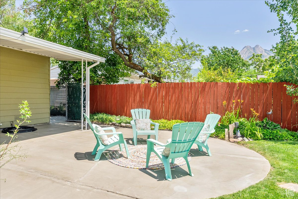 View of patio / terrace with a mountain view