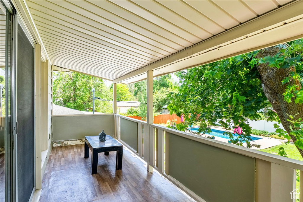 Balcony with view of pool area