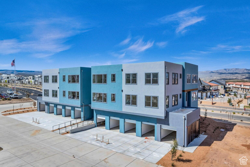 View of building exterior featuring a mountain view