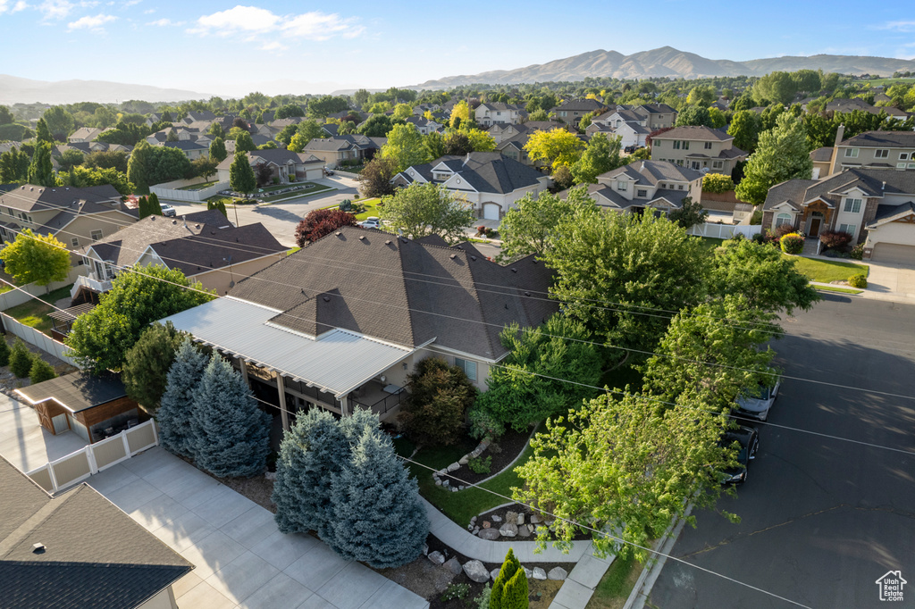 Aerial view of residential area featuring mountains
