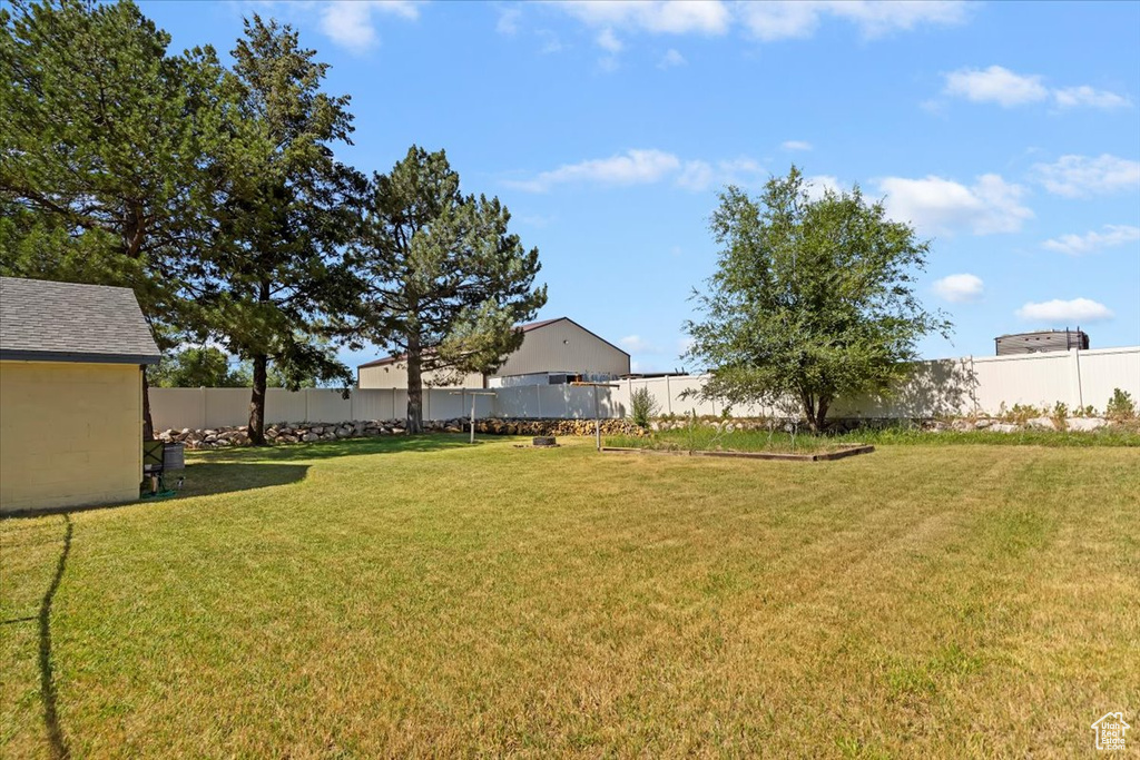 View of fenced backyard