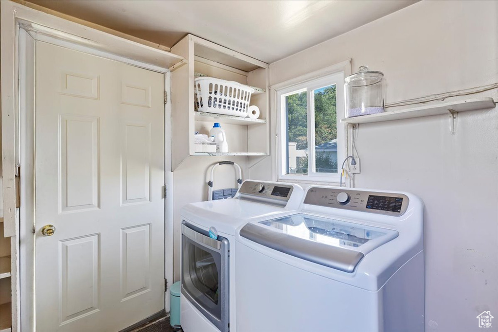 Washroom featuring separate washer and dryer