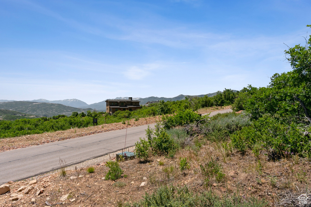 View of asphalt road with a mountain view
