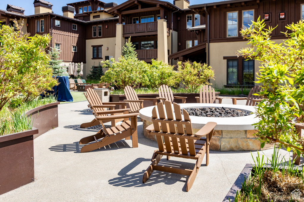 View of community with a fire pit