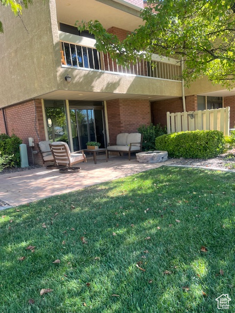 View of patio featuring an outdoor hangout area