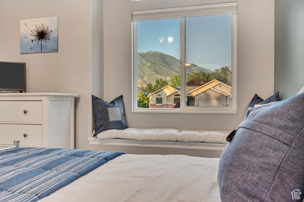 Bedroom with a mountain view