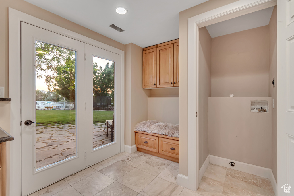 Mudroom featuring baseboards