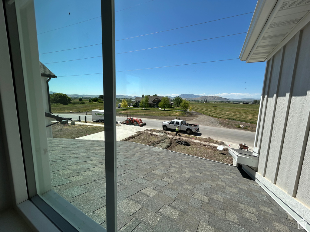 View of patio with a mountain view and a rural view