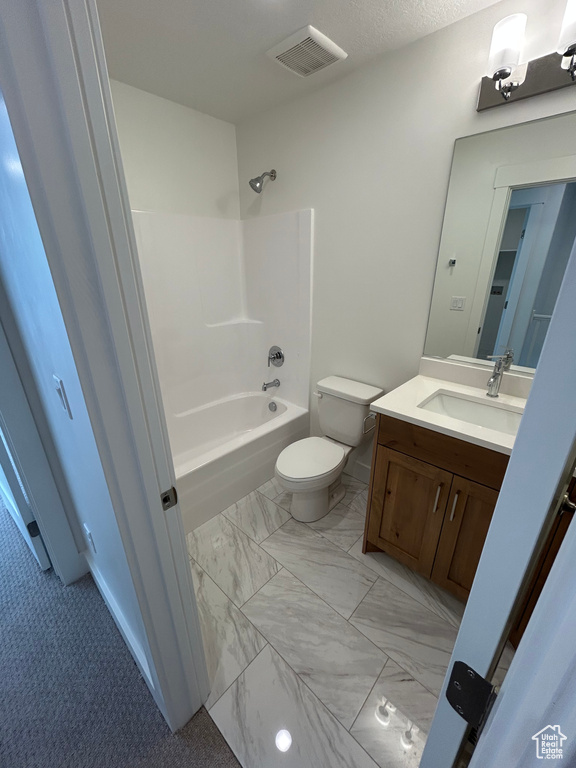 Full bathroom with vanity and shower / tub combination