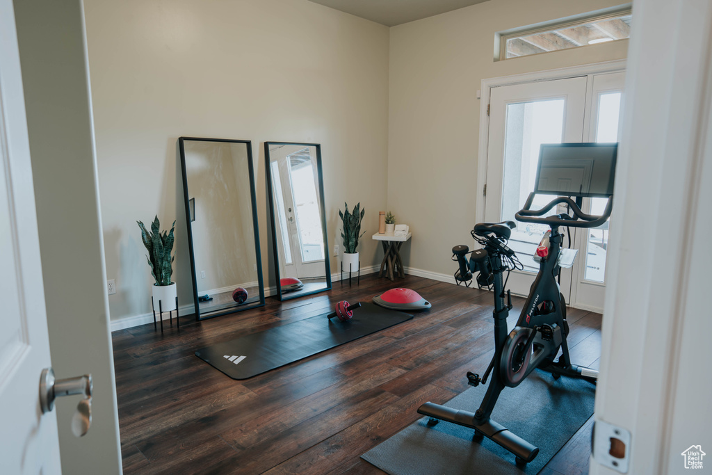 Exercise area featuring hardwood / wood-style flooring