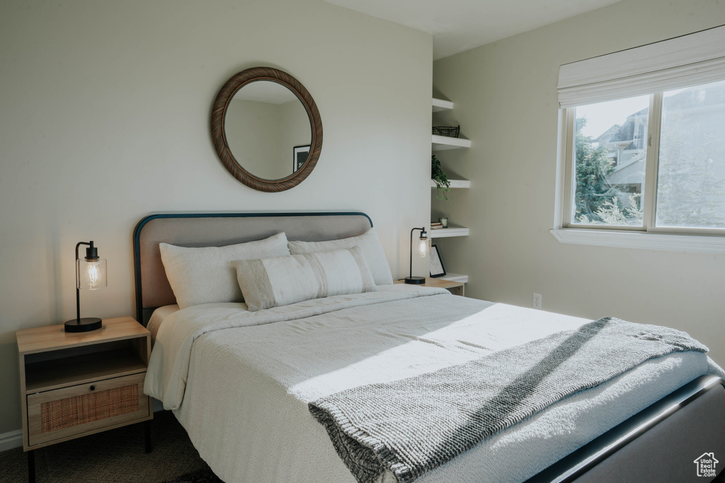 Bedroom featuring carpet flooring