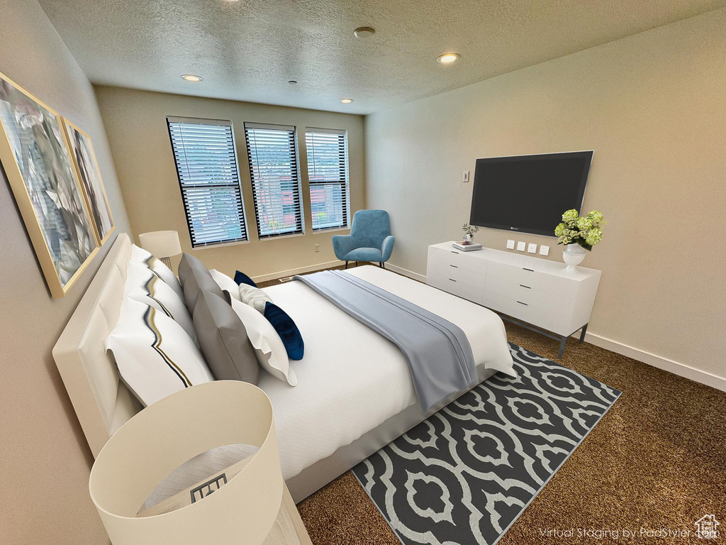 Bedroom featuring carpet floors, a textured ceiling, and recessed lighting