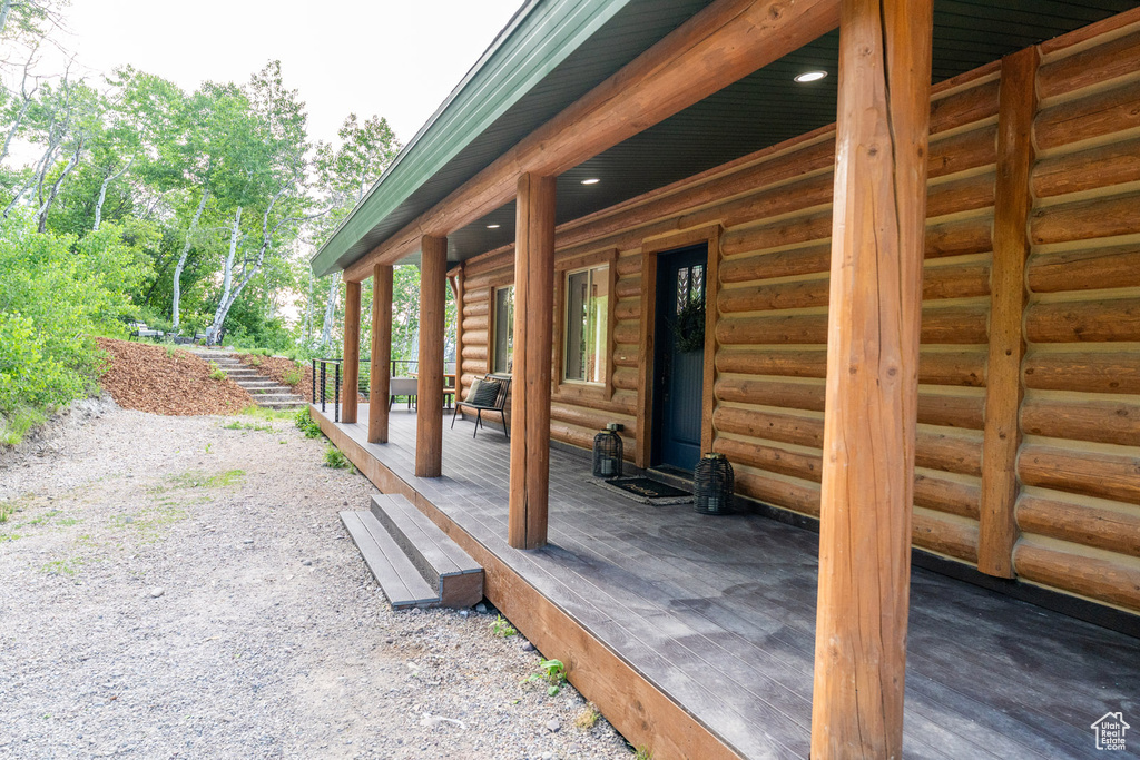 Entrance to property with a porch