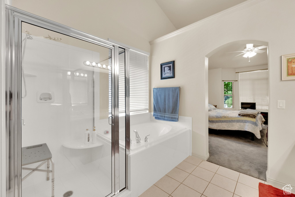 Bathroom featuring tile patterned floors, a garden tub, a shower stall, connected bathroom, and ceiling fan
