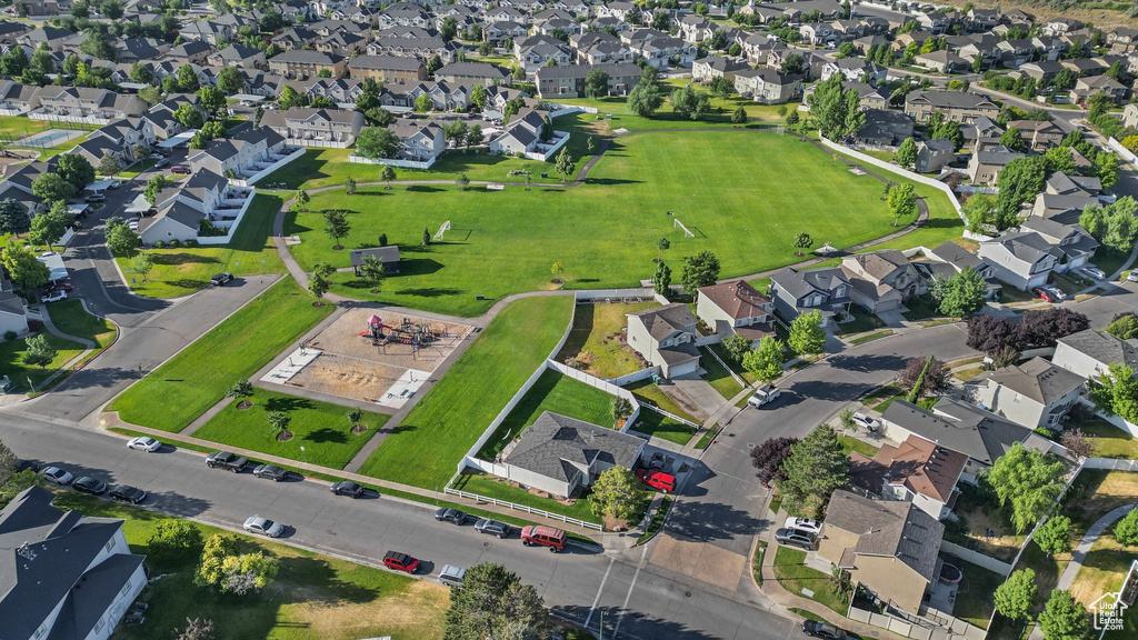 Aerial view of property\'s location featuring nearby suburban area