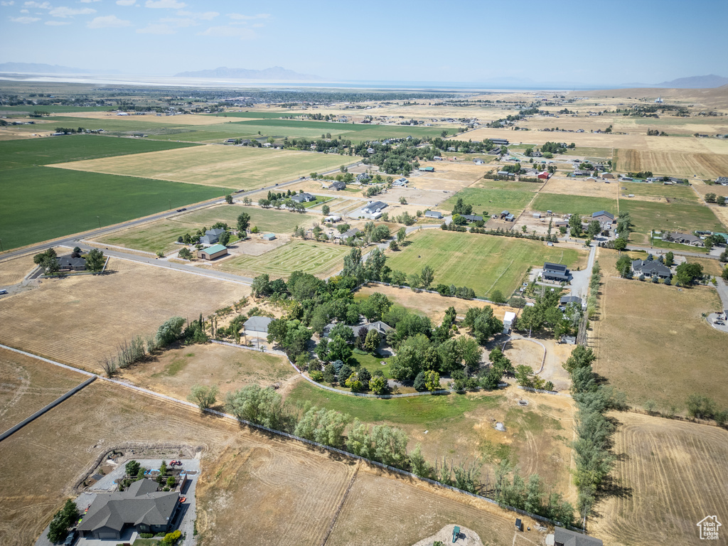 Aerial view of property's location featuring rural landscape and mountains