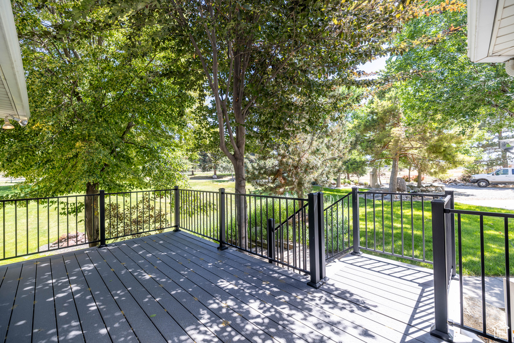 Wooden terrace with a yard